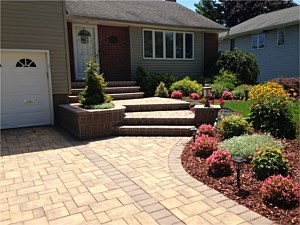 split level front steps porch walkway landing brick paver driveway sahara chestnut cambridge random ledgestone bullnose light post pier planter